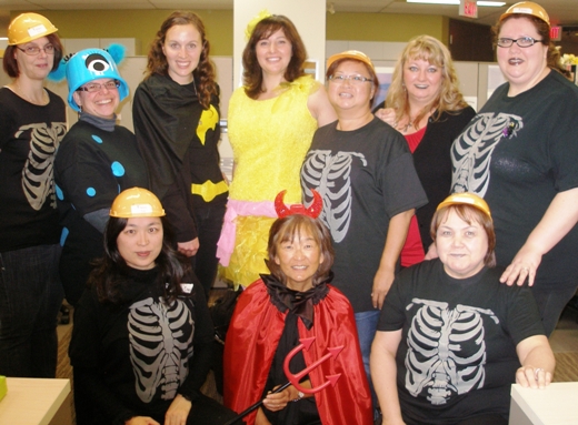 Staff from Community and Family Health at 8100 Granville. The devil made them do it . . . dress up for Halloween.