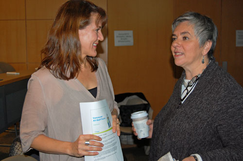 Employee Engagement advisor Lori Benning (left) chats with Vivian about our People First survey results.
