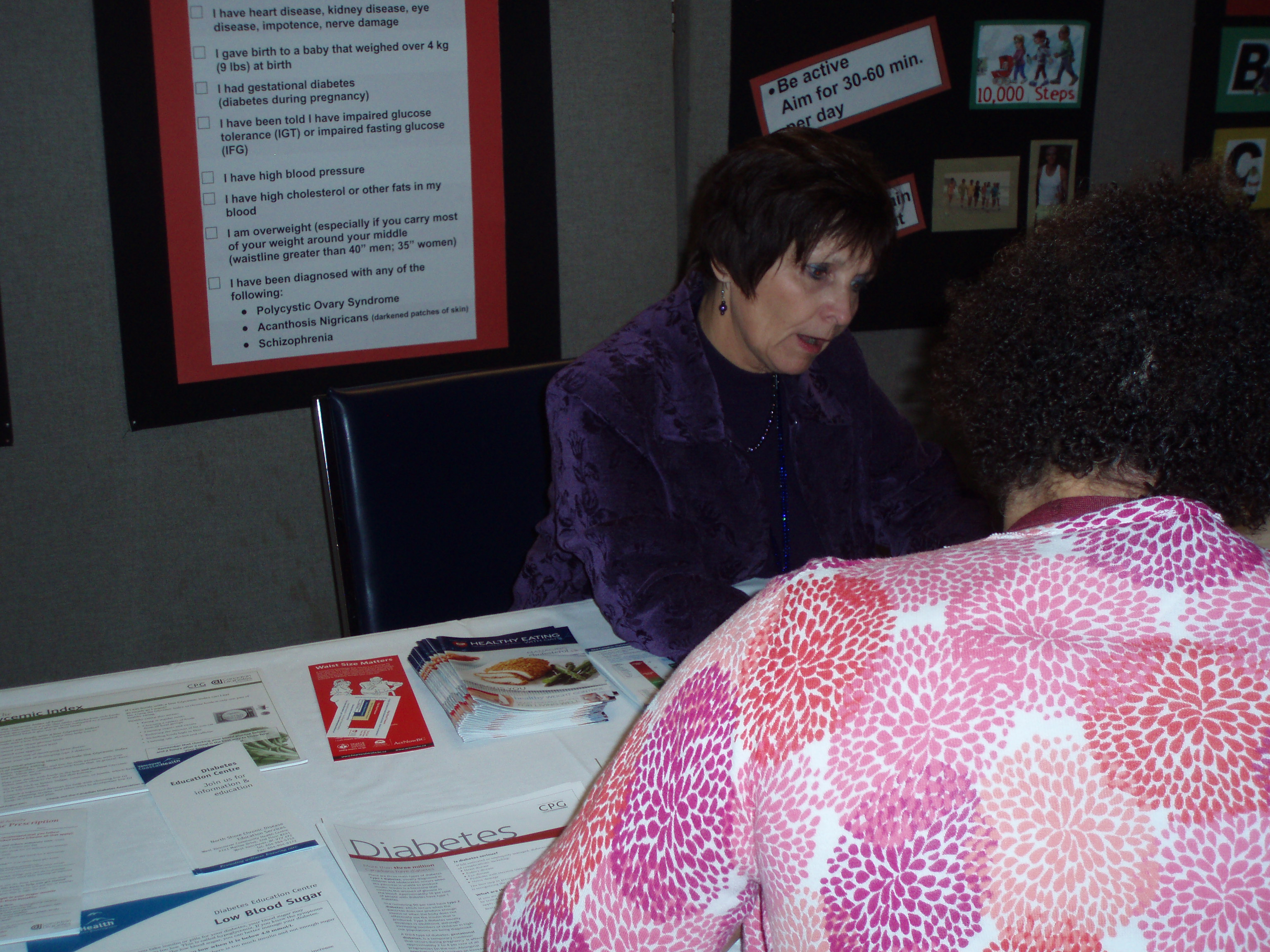 Danielle Bergstrom, RD, discusses diabetes risk with a VCH employee at Lions Gate Hospital