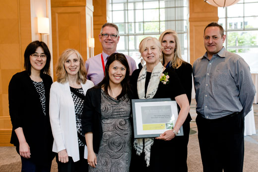 Accepting the award on behalf of everyone at VGH (l to r): Doris Bohl, clinical nurse educator; Teresa Johnston, in-hospital replenishment lead, Lower Mainland, HSSBC; Mike Petrie, manager, support services (laundry/housekeeping), BISS; Goldie Luong, director, special projects; Sydney Scharf, infection control project manager; Jacqueline Per, director, clinical quality & patient safety; and Rian Dodds, senior manager, facilities maintenance & operations. 