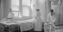 Staff prepare a bed at Vancouver General Hospital, circa 1919. Image Courtesy of the Vancouver Archives.