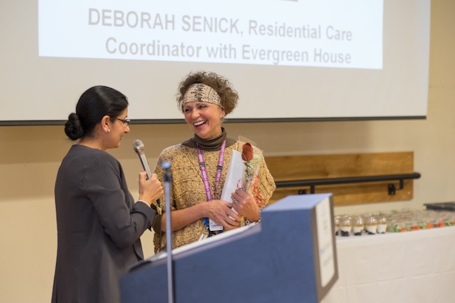 Clinical Practice Award winner Deborah Senick accepts her award from last year's winner Dr. Arvind Kang.