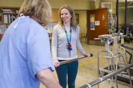 LGH Occupational Therapist Maeve Frost guides a hip fracture patient through follow-up exercises.