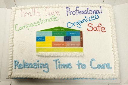 A colossal cake for a colossal achievement. SGH staff and visitors gobbled up cake that was brought in to celebrate completion of the RT2C modules at the hospital.