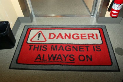 The mat outside the door of the MRI at Lions Gate Hospital is a warning to heed. 