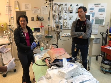 Dr. Julia Low AhKee and Dr. Cal Shapiro at Bella Coola General Hospital are taken through a simulated burn scenario.