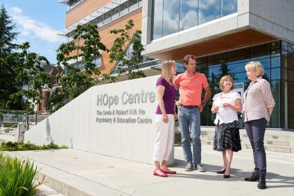 Members of the North Shore youth mental health team enjoy some sun outside the HOpe Centre.