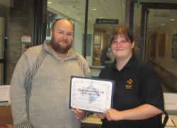 Paladin Security Officer, Joshua Parks being recognised by Paladin Area Security Manager, Kelley Johnson