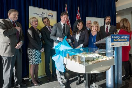 The four North Shore MLAs, Karin Olson, Dr. Ramesh Sahjpaul and Ryan Beedie look on as the model of the new acute care facility at LGH is unveiled.